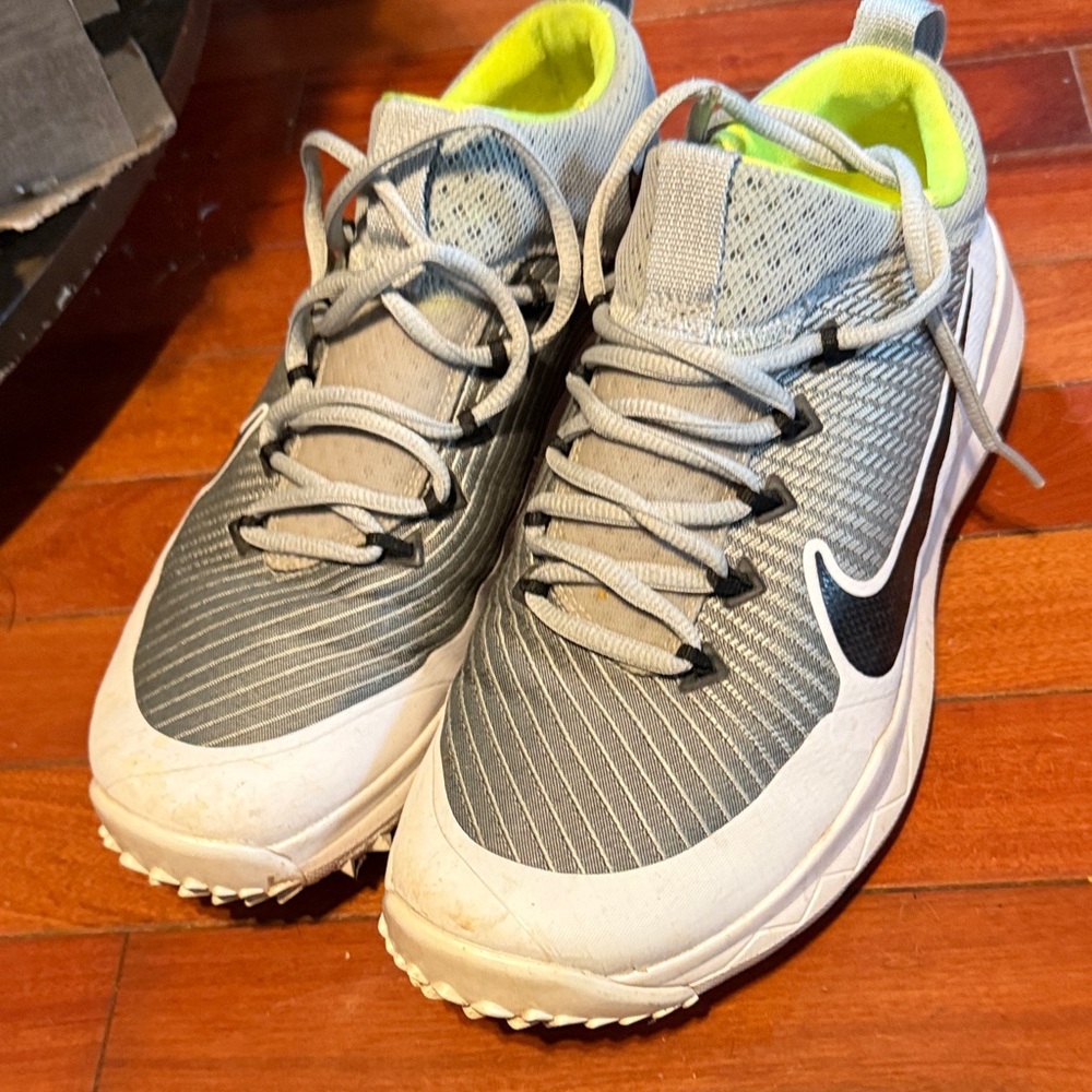Golf Nike and Gray and White Sneaker with Neon Accents perfect for gold